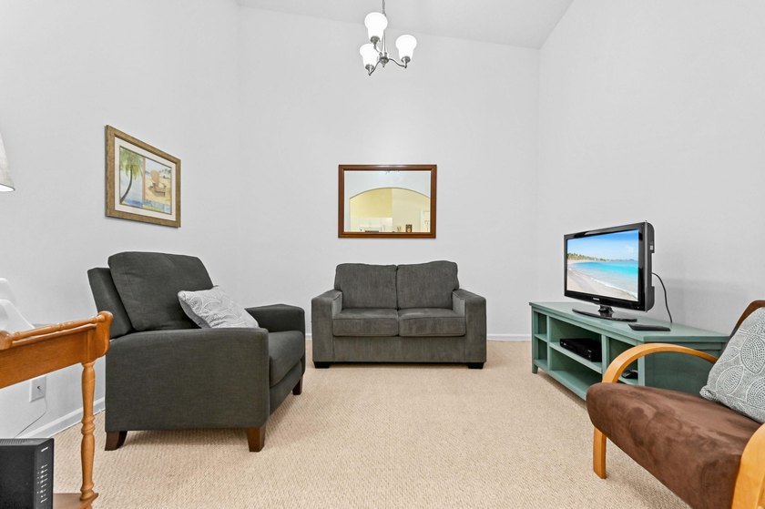 Experience serene lakefront living in this immaculately - photo 10