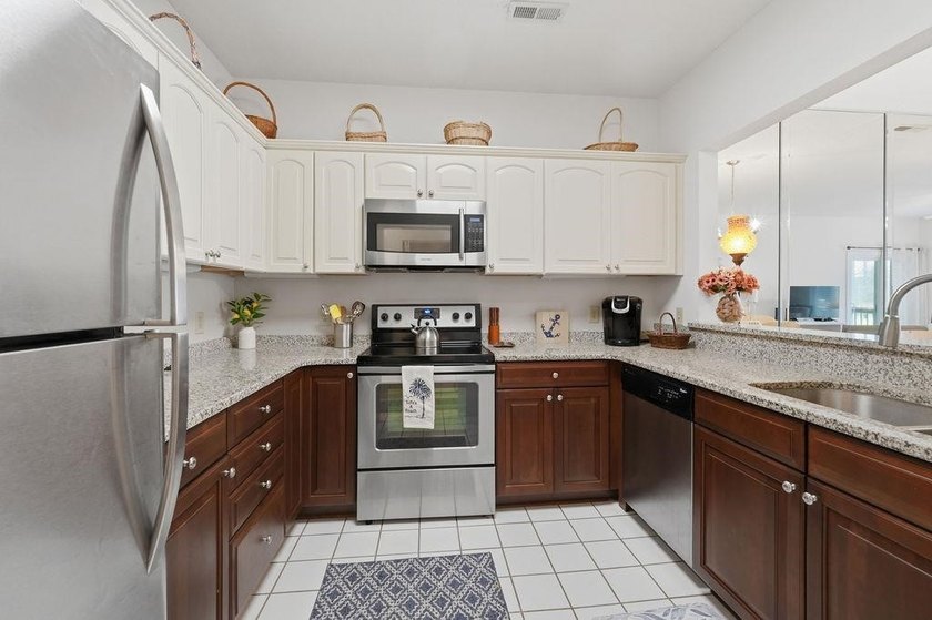 Welcome to Canterbury Court, where coastal convenience, spacious - photo 4