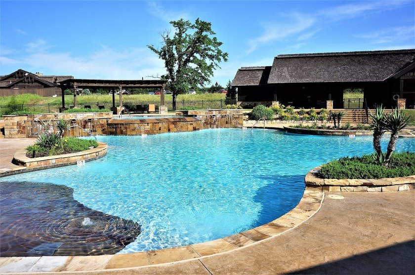 Centrally located in Rock Creek, Pasadera is one of the largest - photo 8