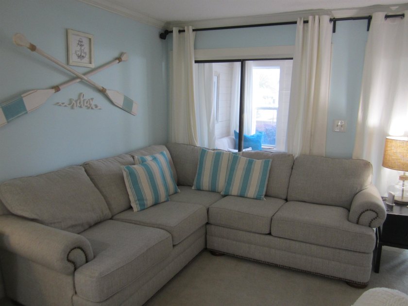 Step into your own coastal escape with this beautifully updated - photo 3