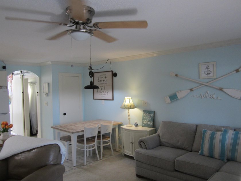Step into your own coastal escape with this beautifully updated - photo 4