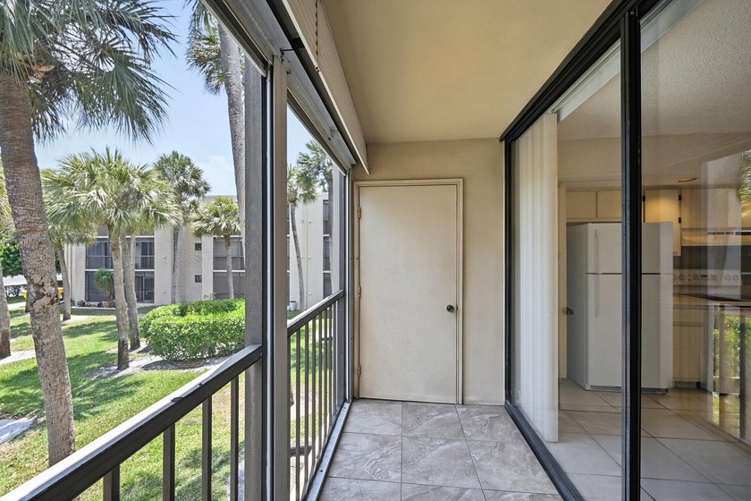 Spacious 2-bedroom, 2-bath corner unit located on the second - photo 2