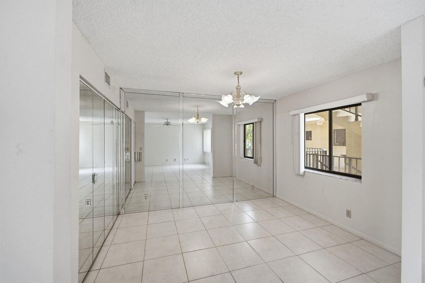 Spacious 2-bedroom, 2-bath corner unit located on the second - photo 9