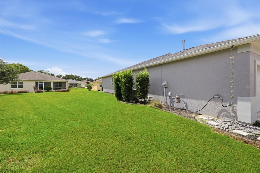 Welcome home to this immaculately maintained 2017-built - photo 50