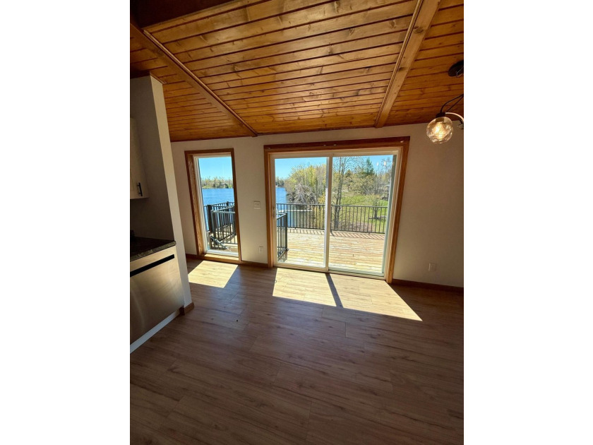 Welcome to lake life on beautiful Big Twin Lake! This - photo 10