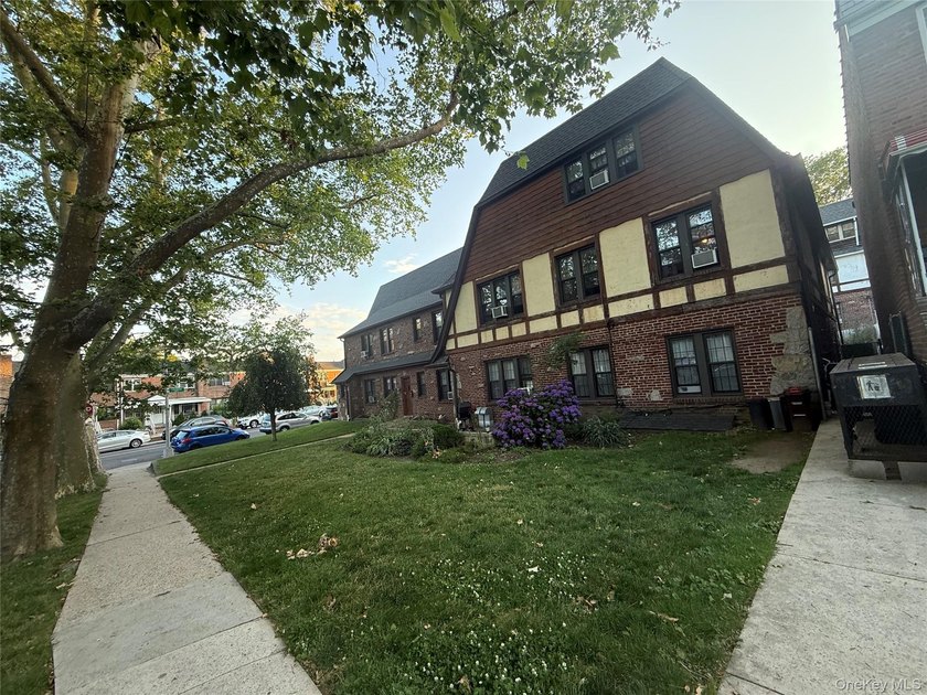 Opportunity is knocking with this legal 8-family Tudor in the - photo 12