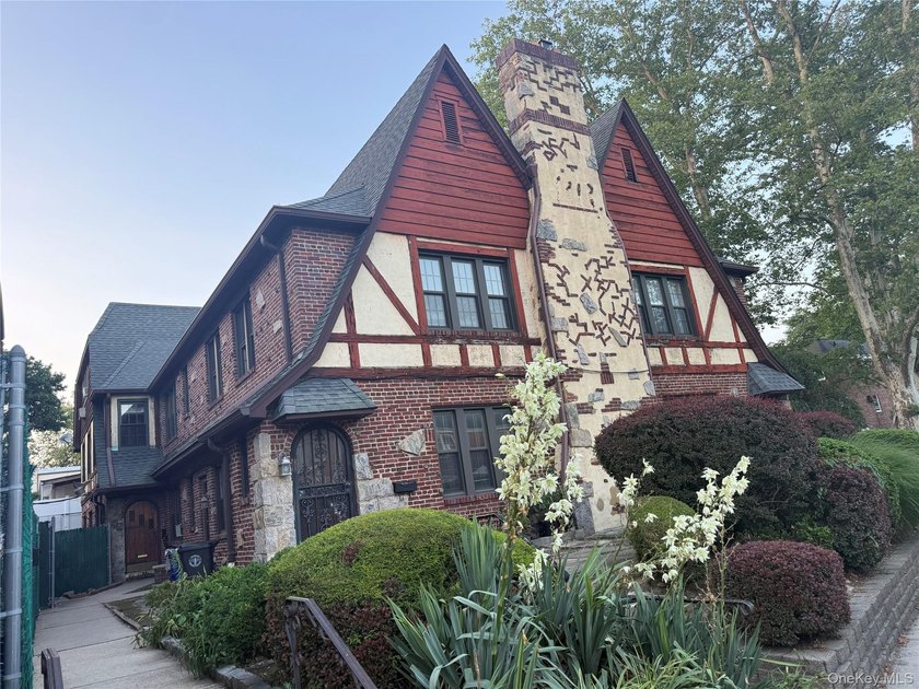 Opportunity is knocking with this legal 8-family Tudor in the - photo 13