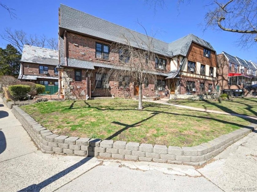 Opportunity is knocking with this legal 8-family Tudor in the - photo 16