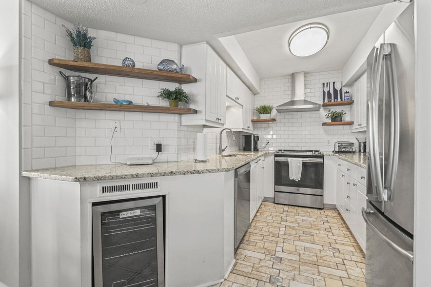 Welcome to The Ocean Bay Club Unit 1305, a beautifully upgraded - photo 4