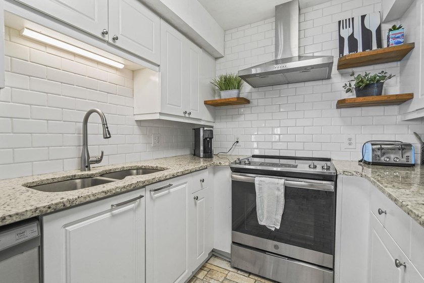 Welcome to The Ocean Bay Club Unit 1305, a beautifully upgraded - photo 6