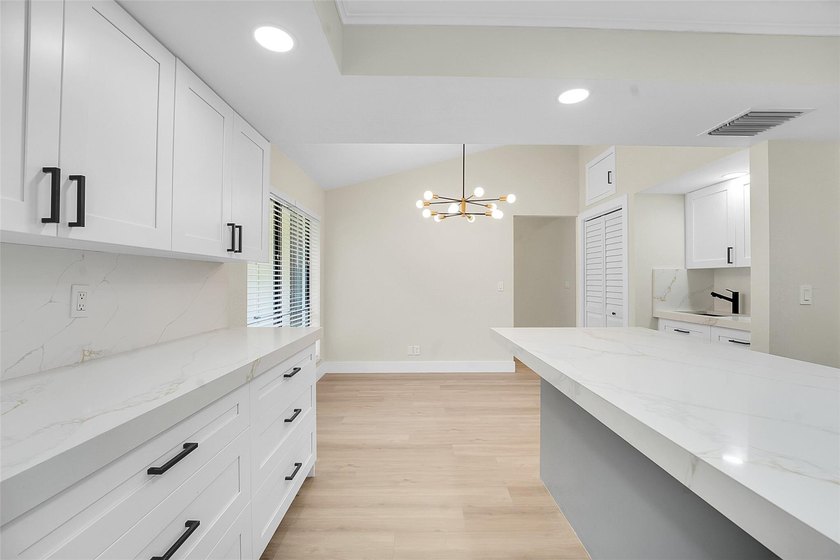An exceptionally remodeled 2 bedroom 2 bathroom villa in the - photo 4