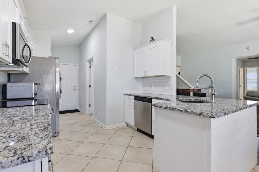 Welcome to this beautifully updated home in the charming - photo 9