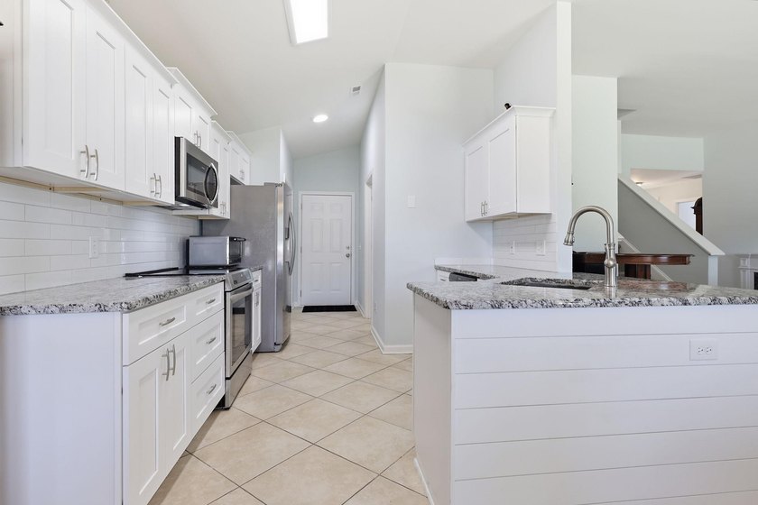 Welcome to this beautifully updated home in the charming - photo 10