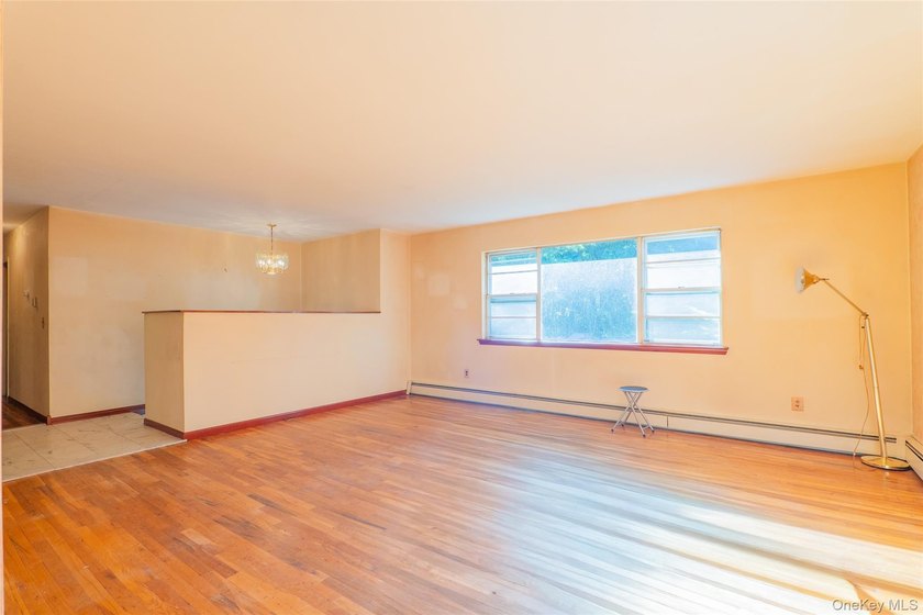 Welcome to 18 Sheryl Lane, a spacious raised ranch nestled on a - photo 7