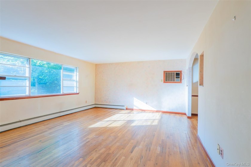 Welcome to 18 Sheryl Lane, a spacious raised ranch nestled on a - photo 9