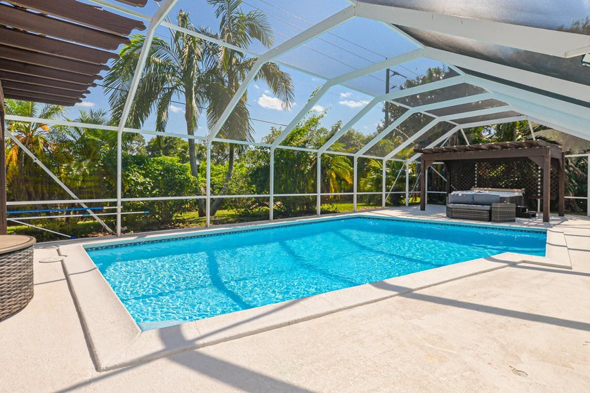 Located in the established community of Sandpiper Bay, this - photo 8