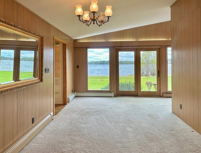 Experience exceptional lake living on Boom Lake, part of the - photo 9