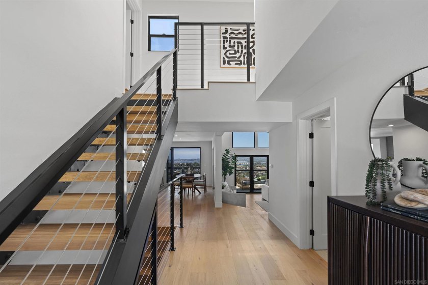 Commandingly perched in coveted Bay Park, this extraordinary - photo 8