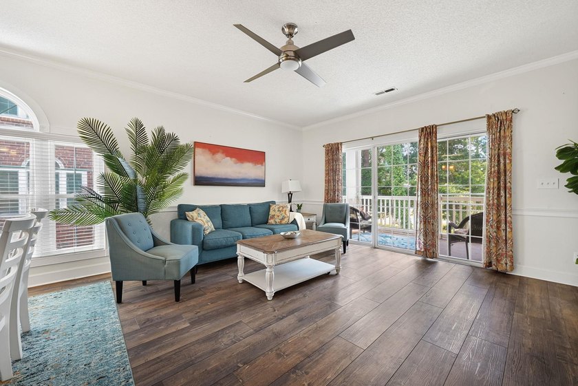 Move-in ready, two-bedroom, two-bathroom end-unit condo with - photo 4