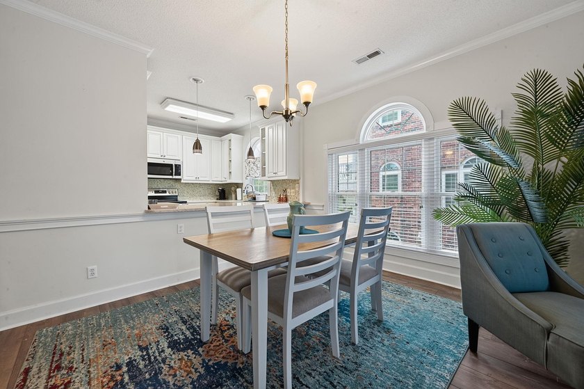 Move-in ready, two-bedroom, two-bathroom end-unit condo with - photo 10