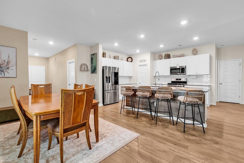 Welcome home to Coastal Charm at the Beach, a beautifully - photo 6