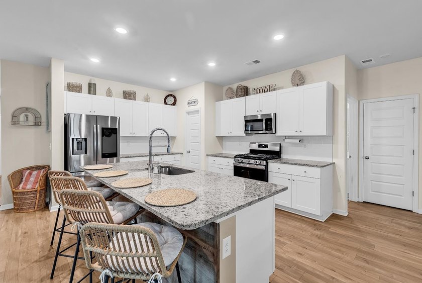 Welcome home to Coastal Charm at the Beach, a beautifully - photo 10