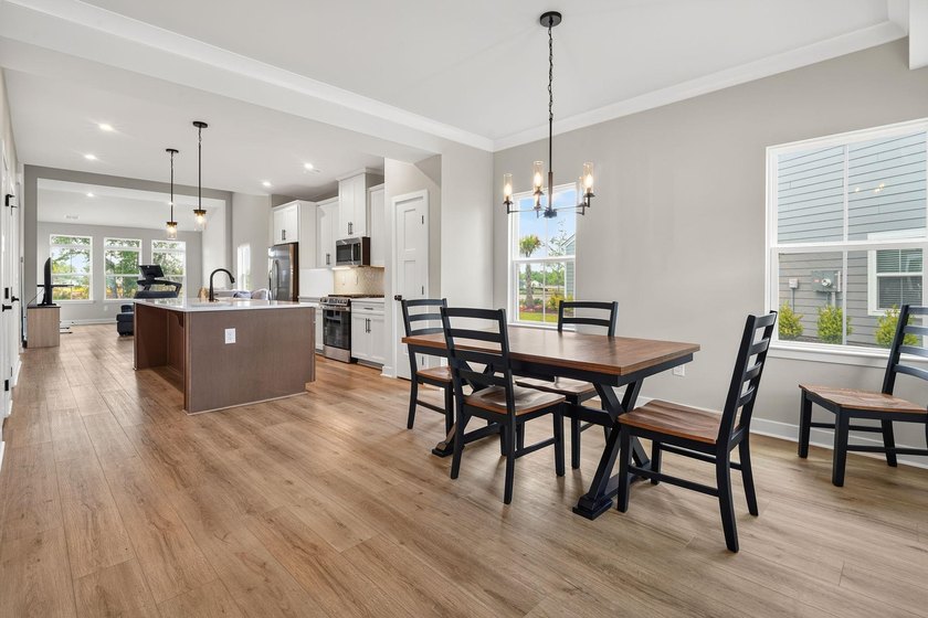 Discover the thoughtfully designed Bethany floor plan, offering - photo 6