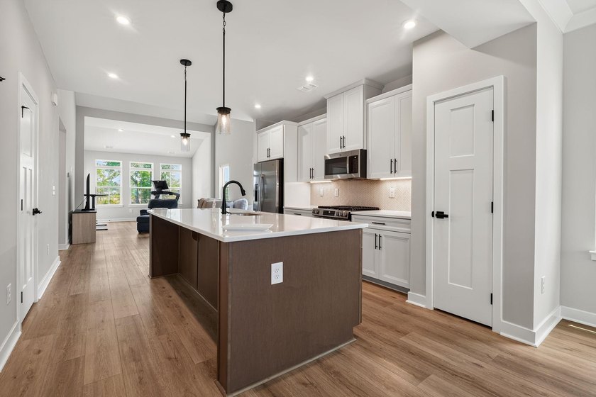 Discover the thoughtfully designed Bethany floor plan, offering - photo 8