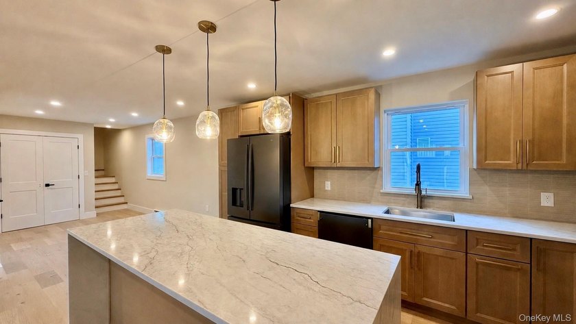 Beautifully renovated ranch offering modern style, comfort, and - photo 5