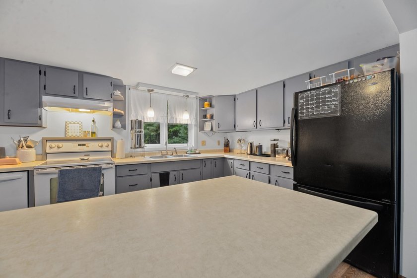 This Northwoods property is bursting with opportunity and - photo 4