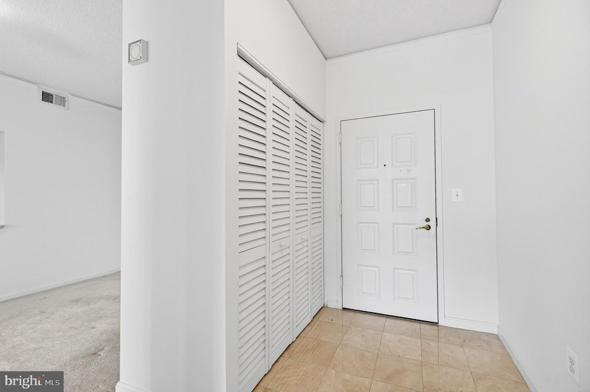 GREAT NEW PRICE on this freshly painted top floor unit with - photo 8
