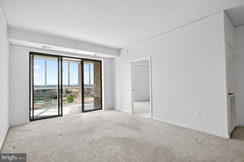 GREAT NEW PRICE on this freshly painted top floor unit with - photo 9