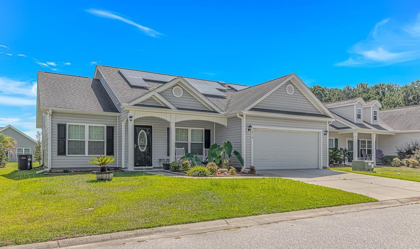 Welcome to this well-maintained 3-bedroom, 2-bath home located - photo 2