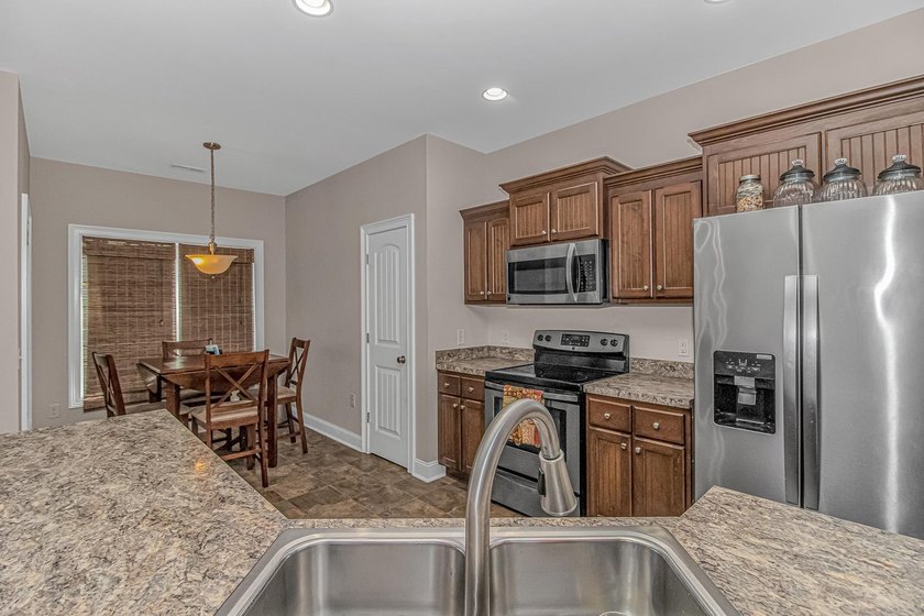 Welcome to this well-maintained 3-bedroom, 2-bath home located - photo 8