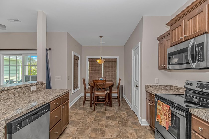 Welcome to this well-maintained 3-bedroom, 2-bath home located - photo 9