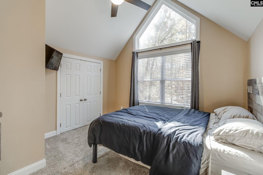 REDUCED! Beautiful Lake front home on a 1.83-acre wooded lot. - photo 33