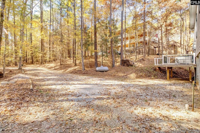 REDUCED! Beautiful Lake front home on a 1.83-acre wooded lot. - photo 40