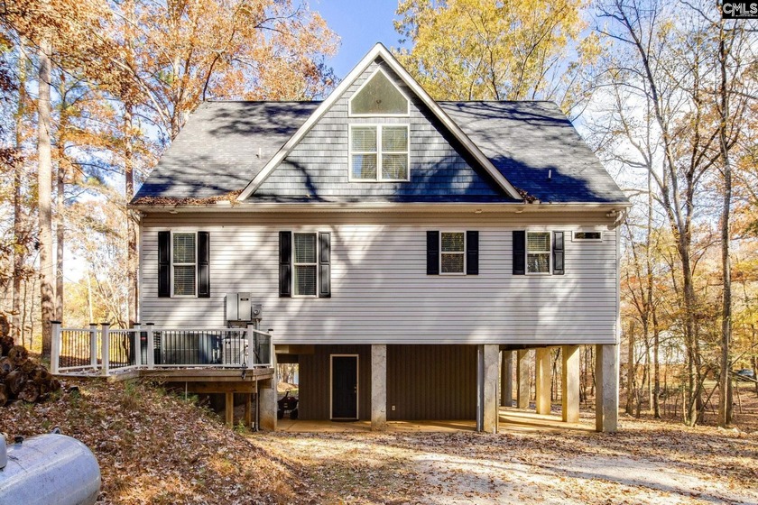 REDUCED! Beautiful Lake front home on a 1.83-acre wooded lot. - photo 44