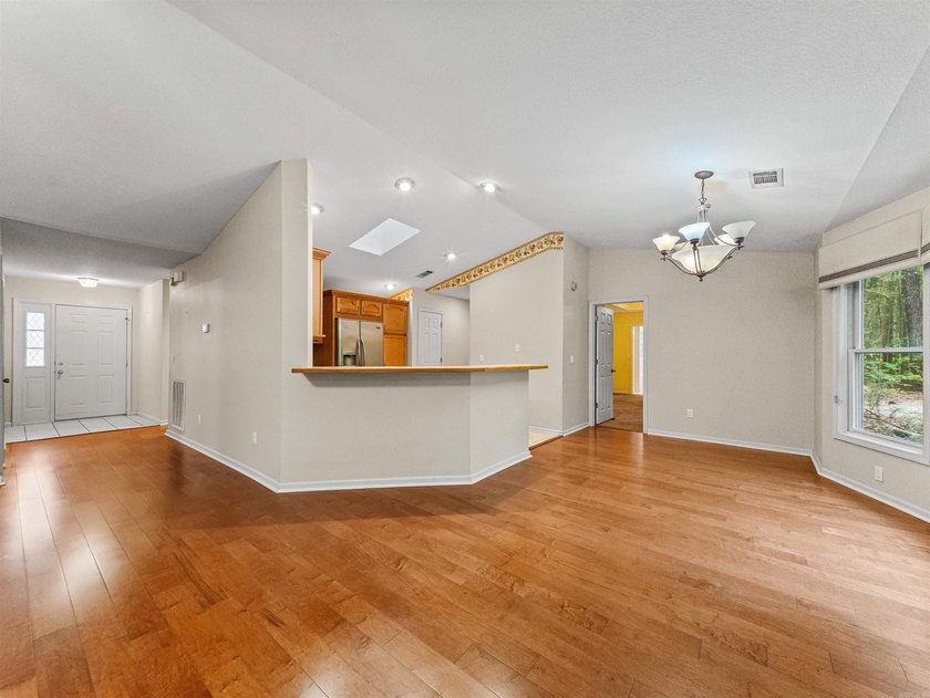 Tucked inside the gated community of Hot Springs Village, this - photo 4