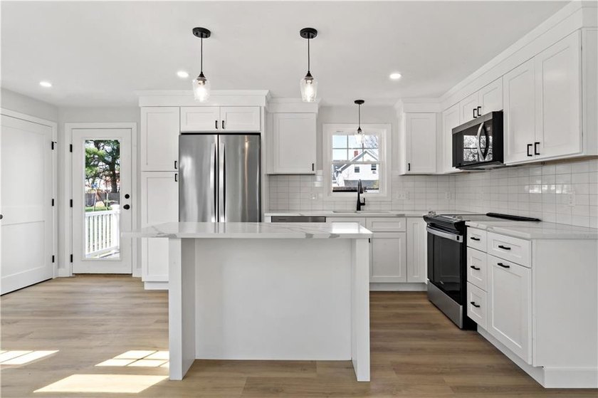 Welcome to your dream home! This unique freestanding condominium - photo 3