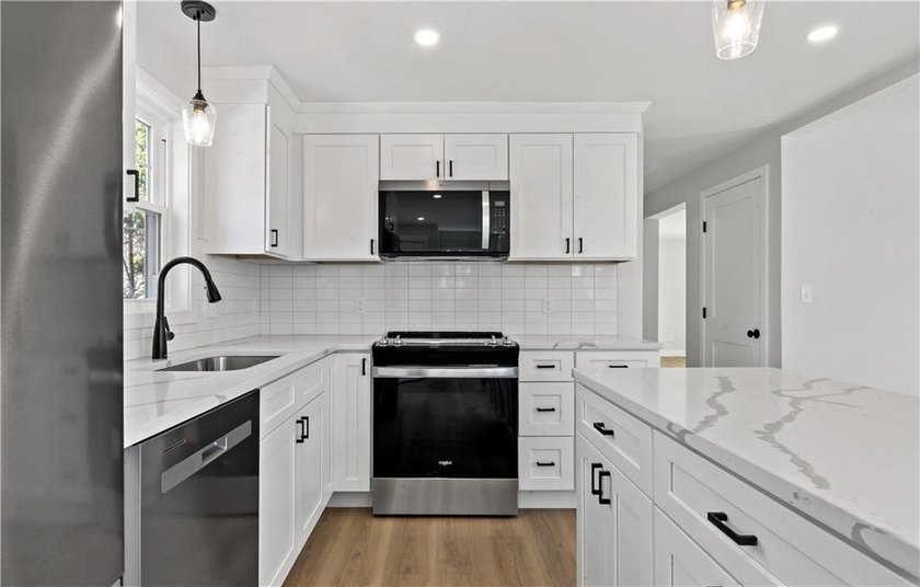 Welcome to your dream home! This unique freestanding condominium - photo 5