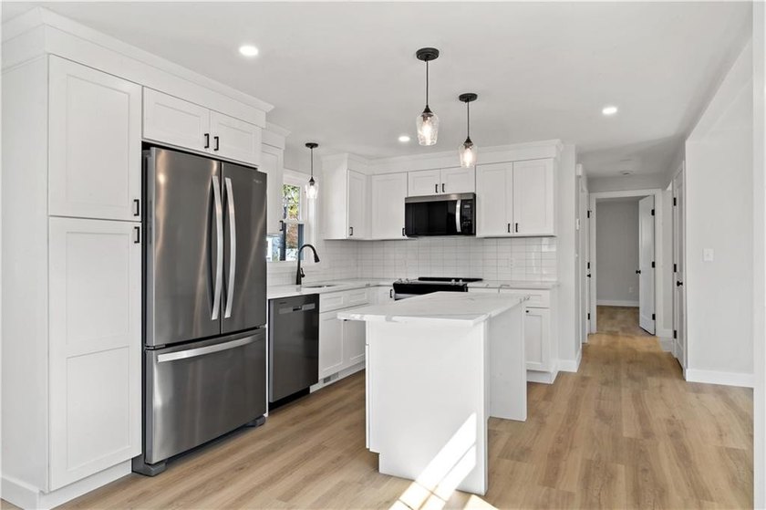 Welcome to your dream home! This unique freestanding condominium - photo 6