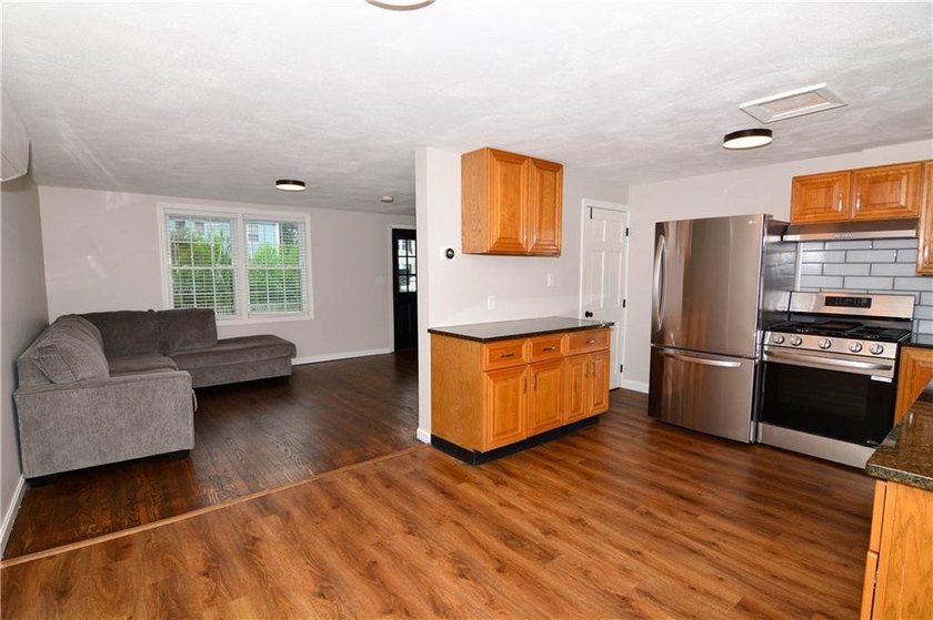 This 2-family in the Yorktown neighborhood of North Kingstown is - photo 4