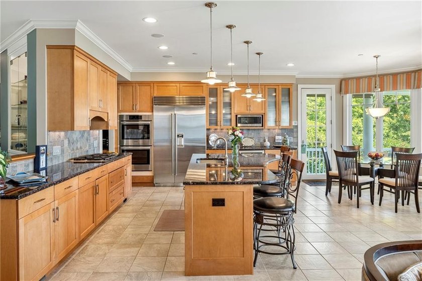 Perched on a private 2-acre waterfront lot in sought-after Plum - photo 7