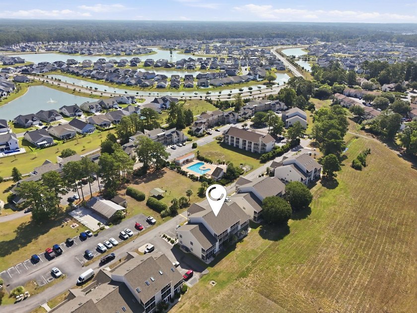 Welcome to this beautifully updated, 2-bedroom, 2-bath end-unit - photo 2