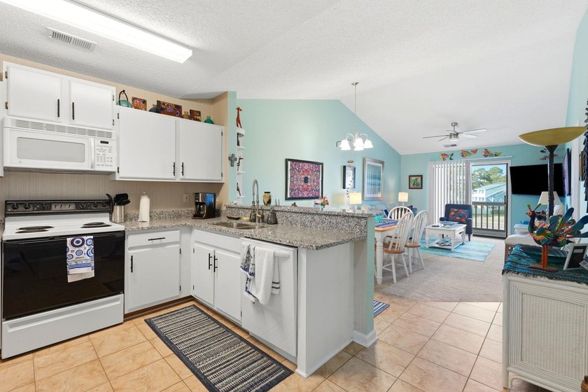 Welcome to this beautifully updated, 2-bedroom, 2-bath end-unit - photo 3