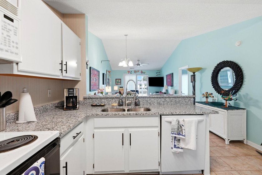 Welcome to this beautifully updated, 2-bedroom, 2-bath end-unit - photo 5