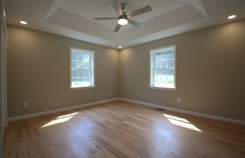 Enjoy the privacy of 1.5 acres in a country setting but offering - photo 14