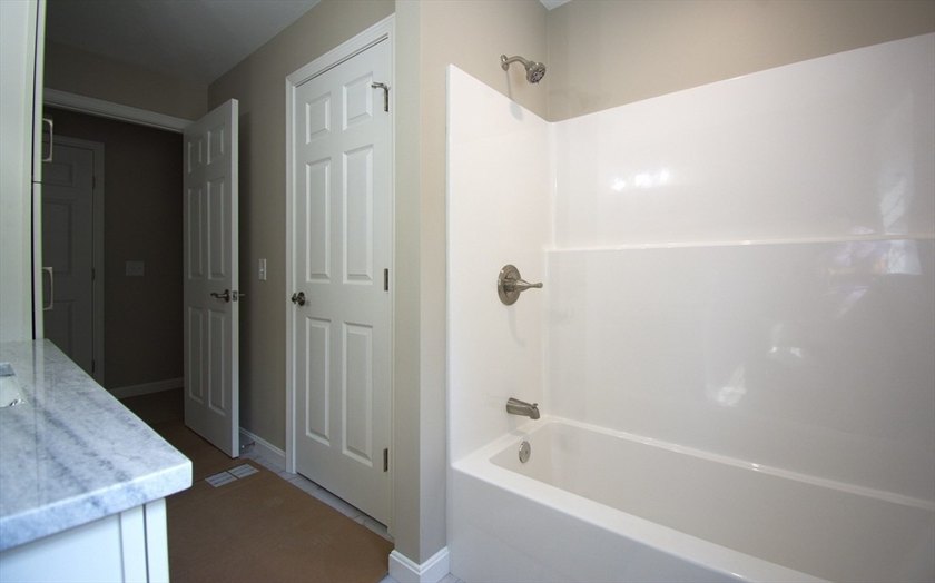Enjoy the privacy of 1.5 acres in a country setting but offering - photo 21