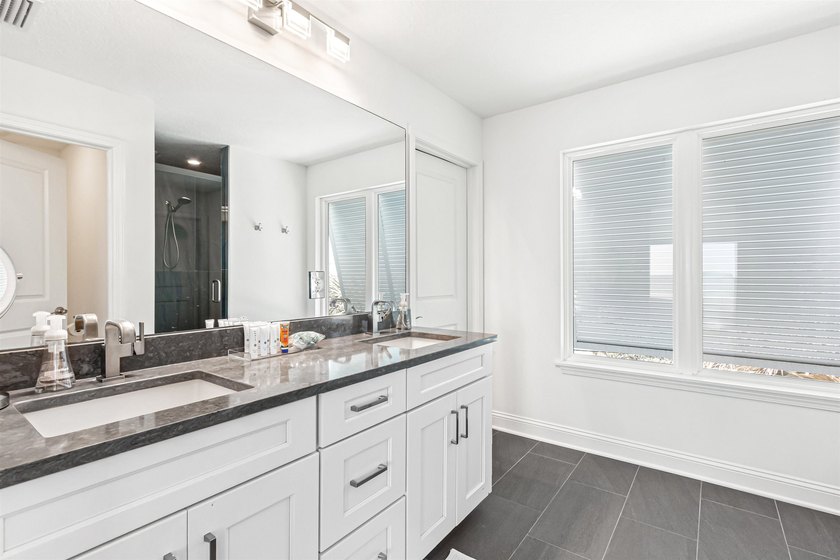 This exquisite 4-bedroom, 4-bathroom oceanfront home offers the - photo 31